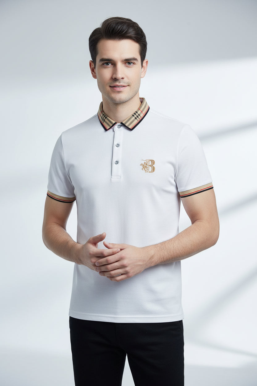 White polo shirt with brand logo, belt, and watch on a gray surface